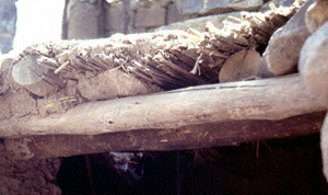A roof made from mud, reeds, and wood